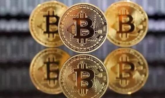 Close-up of Bitcoin mining hardware setup with illuminated screens showing blockchain activity